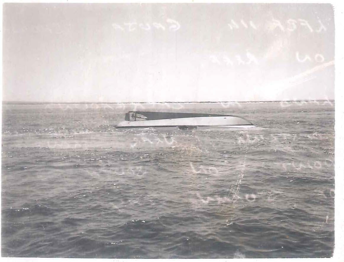 The upturned hull of Gauja floating offshore